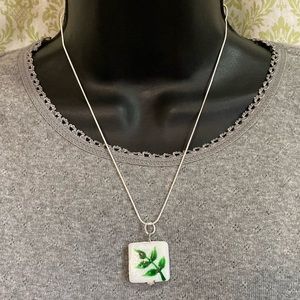 Sterling silver necklace with ceramic leaf pendant